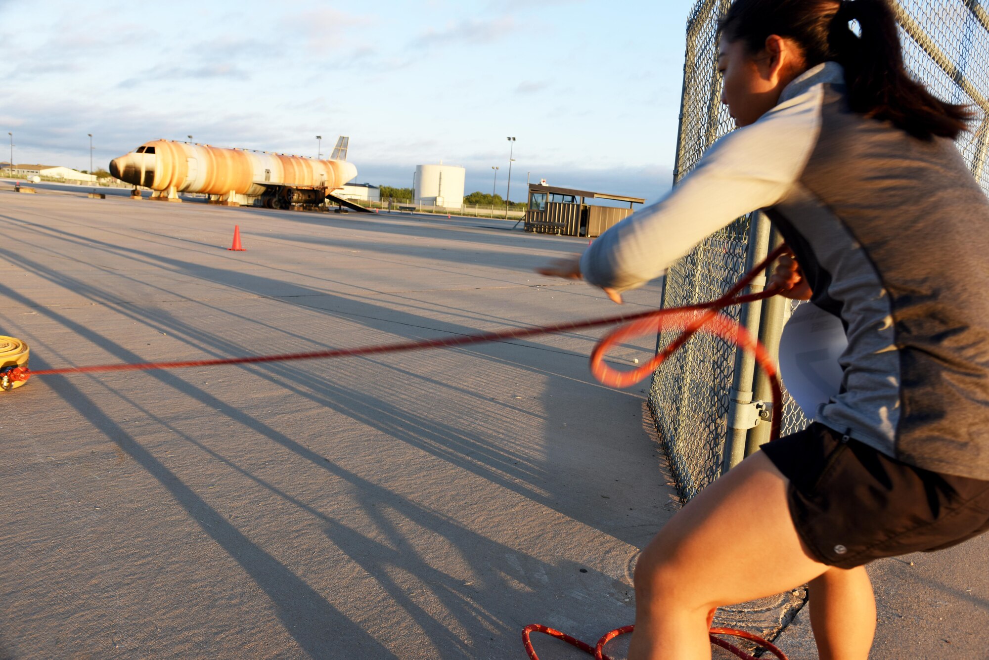 U.S. Marine Corps Pfc. Dahee Park, Marine Corps Detachment student, pulls a firehose at the Louis F. Garland Department of Defense Fire Academy on Goodfellow Air Force Base, Texas, during the 3rd Annual Blood, Sweat and Stairs competition, Oct. 15, 2016. Dahee ran the fastest time for females at 12 minutes and 55 seconds. The competition is held each year to honor the first responders of 9/11, however the 312th TRS rescheduled it this year due to bad weather. (U.S. Air Force photo by Senior Airman Joshua Edwards/Released) 