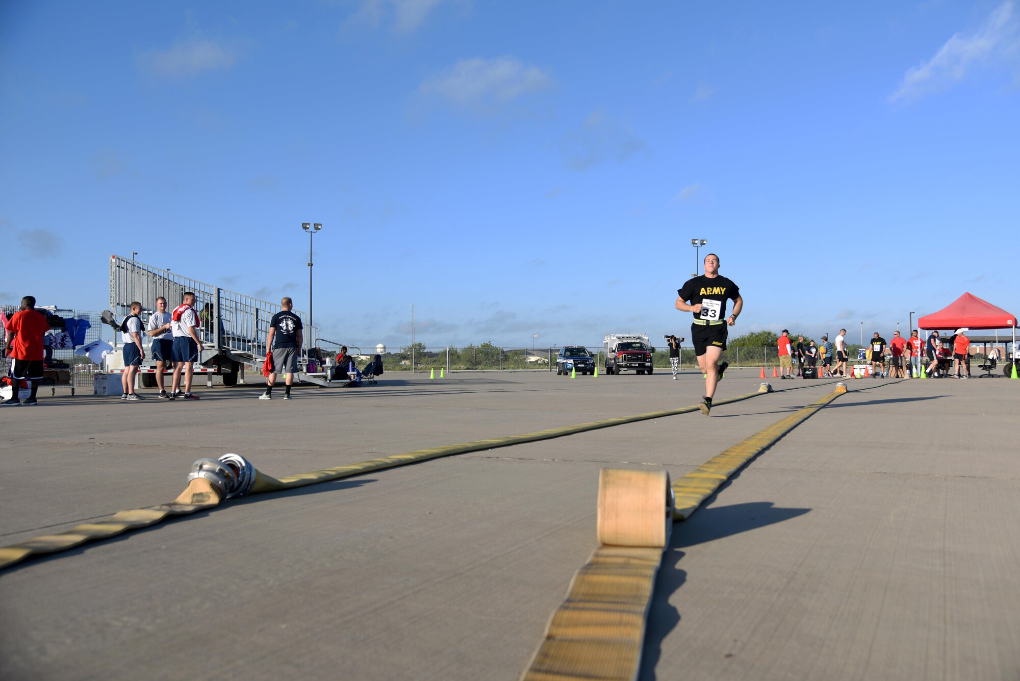 U.S. Army Pfc. Austin Reyhe, 344th Military Intelligence Battalion student, starts his run for the 3rd Annual Blood Blood, Sweat and Stairs competition at the Louis F. Garland Department of Defense Fire Academy on Goodfellow Air Force Base, Texas, Oct. 15, 2016. Reyhe took a fitness test before coming to the event, and his team placed in second. The competition is held each year to honor the first responders of 9/11, however the 312th TRS rescheduled it this year due to bad weather. (U.S. Air Force photo by Senior Airman Joshua Edwards/Released)