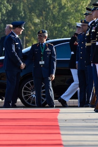 Maj. Gen. Darryl Burke, left, Air Force District of Washington commander, greets Lt. Gen. Hamad Muhammed Thani Al Rumaithi, right, chief of staff of the United Arab Emirates’ Armed Forces, during the Chief of Defense Conference on Joint Base Andrews, Md., Oct. 17, 2016. The conference is held annually and brought together senior military leaders from 50 countries to meet and discuss mutual security challenges, improve joint relationships and foster security cooperation. (U.S. Air Force photo by Airman 1st Class Valentina Lopez)
