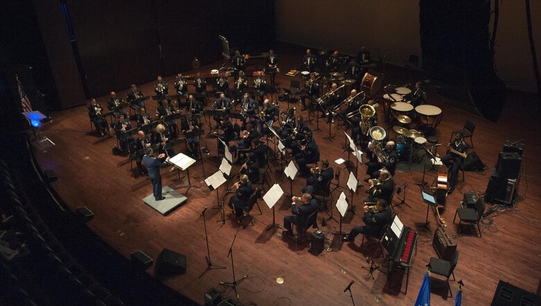 Capt. Rafael Toro-Quinones, commander and conductor of the United States Air Force Band of the Golden West, Travis Air Force Base, Calif., directs the U.S. Air Force Heritage of America Band to play “There’s No Business Like Show Business” during a USAF HOAB 75th Anniversary Band Concert at the Ferguson Center for the Arts in Newport News, Va., Oct. 1, 2016. Toro-Quinones was the former USAF HOAB conductor from 2009 to 20011. The USAF HOAB was one of the original Army Air Corps bands, created by order of the Secretary of War on October 1, 1941 and assigned to Barksdale Field, Louisiana. In June 1946, after being assigned to Brooks Field, Texas, the band arrived at Joint Base Langley-Eustis, Virginia, its current home. (U.S. Air Force photo by Staff Sgt. Nick Wilson) 