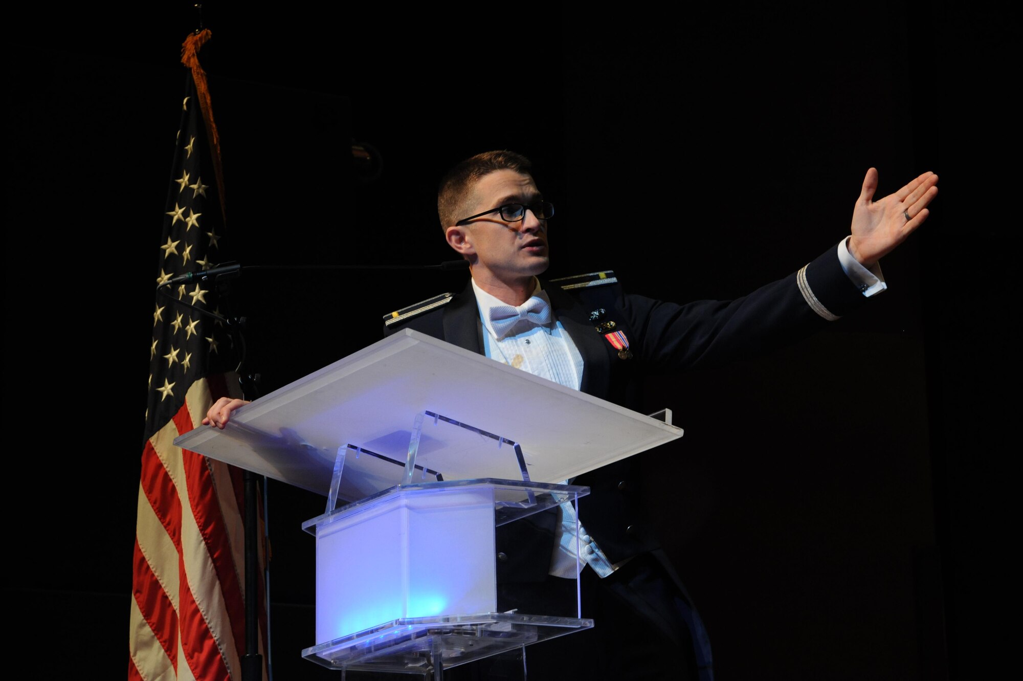 2nd Lt. Philip Emery, U.S. Air Force Heritage of America Band flight commander and associate conductor, speaks during a USAF HOAB 75th Anniversary Band Concert at the Ferguson Center for the Arts in Newport News, Va., Oct. 1, 2016. Since its creation, the band has represented the Air Force at musical and military events. This concert represented the band’s 75 years of heritage since it was first established in 1941. (U.S. Air Force photo by Staff Sgt. Nick Wilson)