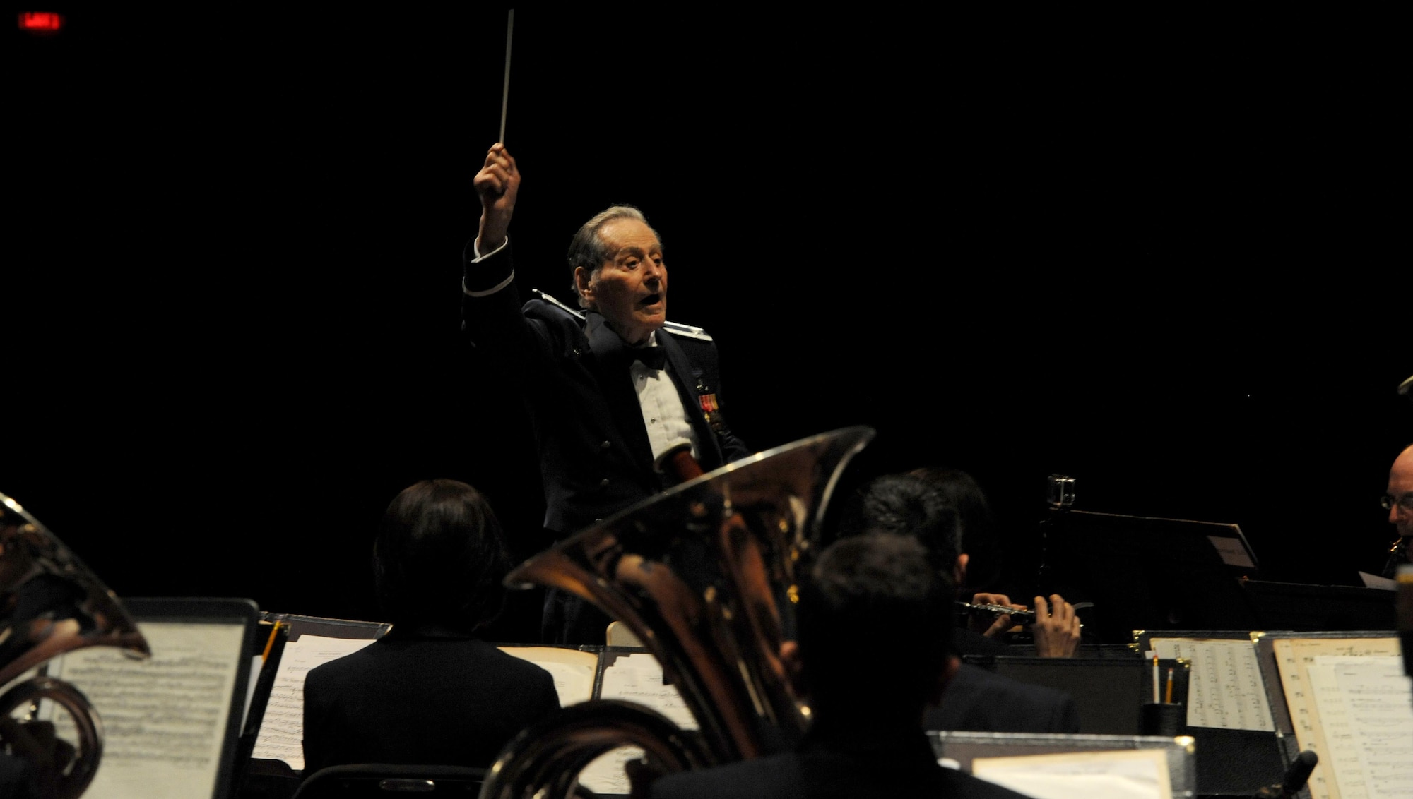 Col. (Ret.) Arnald Gabriel, former 564th Tactical Air Command Band director, leads the U.S. Air Force Heritage of America Band to play “Stars and Stripes Forever” during a USAF HOAB 75th Anniversary Band Concert at the Ferguson Center for the Arts in Newport News, Va., Oct. 1, 2016. Gabriel has served in the Air Force from the year it was created, in 1947, to 1985. Throughout his life, he has received three Legions of Merit, been named an Honorary Life Member of the American Bandmasters Association and inducted into the National Band Association Hall of Fame of Distinguished Band Conductors. In 2008, the US Air Force Band dedicated the Arnald D. Gabriel Hall, Bolling Air Force Base, Washington, D.C., in his honor. (U.S. Air Force photo by Staff Sgt. Nick Wilson)