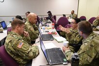 The command team and Operations staff assigned to 3rd Battalion, 335th Infantry Regiment, 157th Infantry Brigade, First Army discuss training and mobilization plans during a mobilization assessment brief at the 85th Support Command headquarters in Arlington Heights, Ill., Oct. 15, 2016. Leaders of Army Reserve training support and logistic support battalions operationally controlled by First Army attended the brief ahead of their upcoming mobilizations as observer coach/trainers to support First Army’s mission to train Army Reserve and Army National Guard units.
(U.S. Army photo by Master Sgt. Anthony L. Taylor, First Army Public Affairs)
