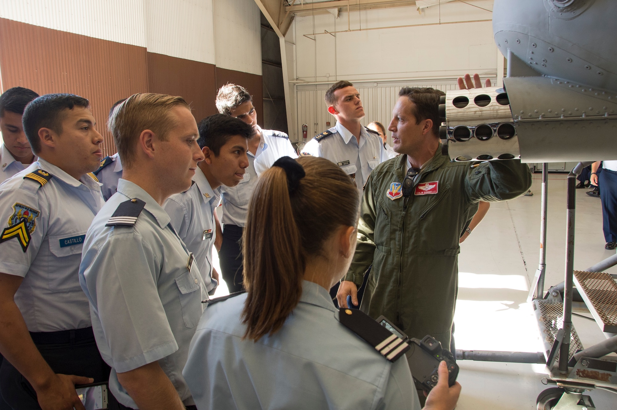 U.S. Air Force Lt. Col. Colin Donnelly, 355th Operations Group deputy commander, briefs cadets from various academies throughout Latin America on the capabilities of the A-10 Warthog on Davis-Monthan Air Force Base, Ariz., Oct. 13, 2016.  Cadets from Argentina, Brazil, Chile, Colombia, Dominican Republic, El Salvador, Honduras, Guatemala, Mexico, Nicaragua, Paraguay, Peru and Uruguay took part in the three-week visit to the U.S. as part of the Latin American Cadet Initiative. (U.S. Air Force photo by Staff Sgt. Adam Grant)