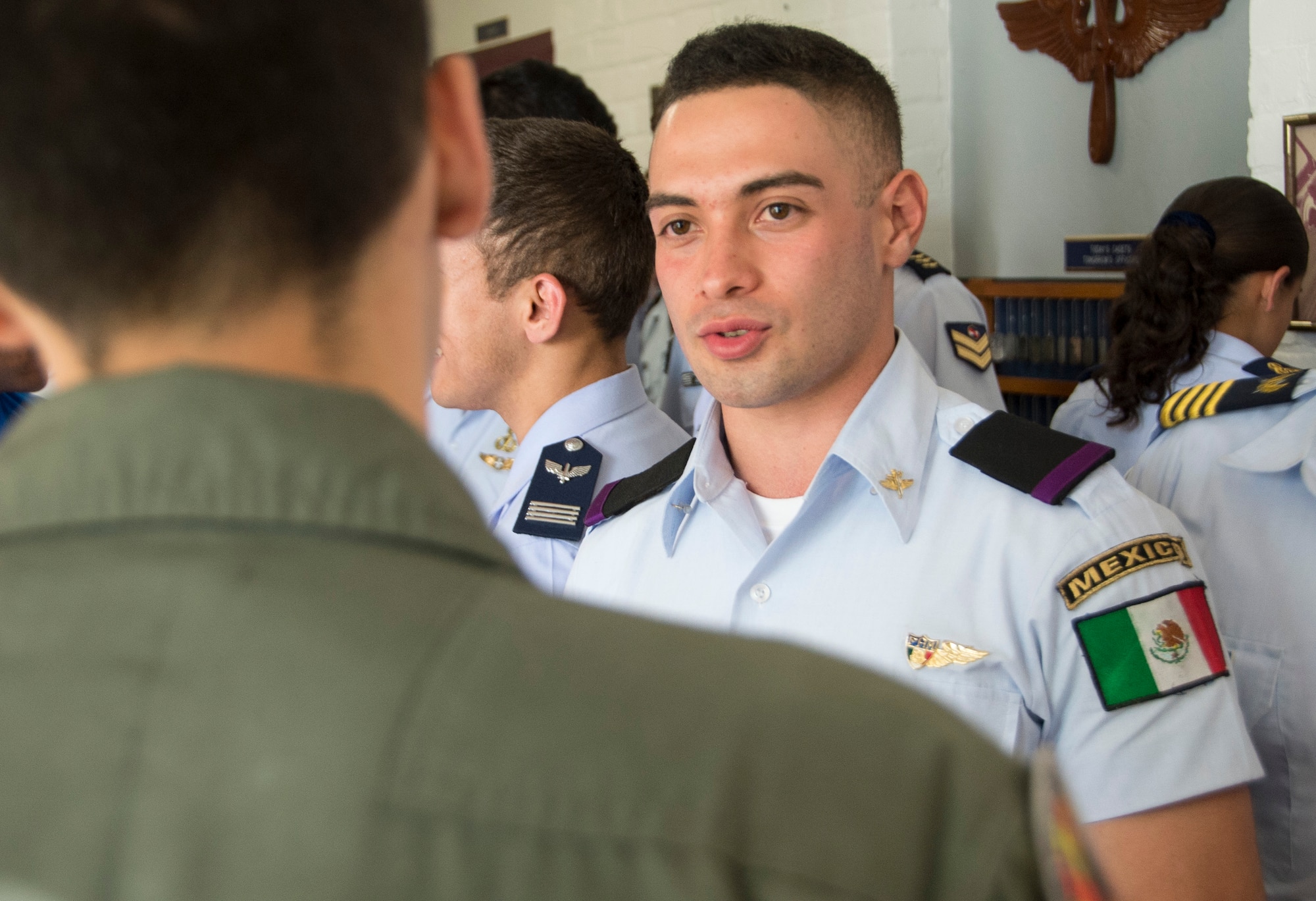 A Latin American Cadet Initiative (LACI) cadet speaks with a U.S. Air Force Reserve Officer Training Corps cadet, from ROTC Detachment 20, during a program familiarization tour at the University of Arizona, Tucson, Ariz., and Oct. 13, 2016. The LACI program allows cadets from Latin American air force academies to visit the U.S. for three-weeks to familiarize them with the U.S. Air Force and receive briefings on culture, history, and diverse missions from Air Force bases around the U.S. (U.S. Air Force photo by Staff Sgt. Adam Grant)
