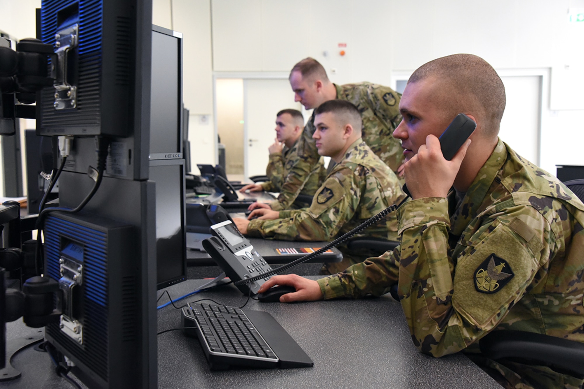 LANDSTUHL, Germany – Soldiers of Company C, 53rd Signal Battalion man the Wideband Satellite Communications Operations Center in Landstuhl, Germany. The primary mission of the WSOC is to provide wideband payload control, transmission control and defensive space control for the warfighter. (U.S. Army photo by Carrie David)
