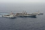 161013-N-SU278-0121 South China Sea (Oct. 13, 2016) From left, the amphibious dock landing ship USS Germantown (LSD 42), the Military Sealift Command fleet oiler USNS Walter S. Diehl (T-AO 193), the amphibious assault ship USS Bonhomme Richard (LHD 6) and the guided-missile destroyer USS Decatur (DDG 73) steam in formation as part of interoperability drills between the Pacific Surface Action Group (PAC SAG) and Bonhomme Richard Expeditionary Strike Group (BHR ESG) in the South China Sea, Oct. 13, 2016. The drills are meant to enhance readiness of cruiser-destroyer ships to rapidly integrate with an amphibious task force to provide increased capability for amphibious operations in support of crisis response or disaster relief. (U.S. Navy photo by Petty Officer 2nd Class Will Gaskill) 
