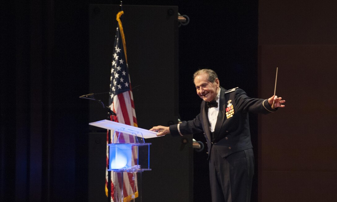 Col. (Ret.) Arnald Gabriel, former 564th Tactical Air Command Band director, bows to the audience after leads the U.S. Air Force Heritage of America Band to play “Stars and Stripes Forever” during a USAF HOAB 75th Anniversary Band Concert at the Ferguson Center for the Arts in Newport News, Va., Oct. 1, 2016. Gabriel is also a World War II veteran. (U.S. Air Force photo by Staff Sgt. Nick Wilson)