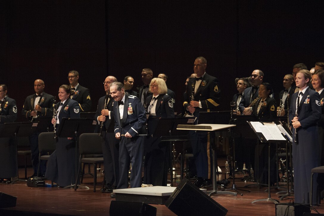 Col. (Ret.) Arnald Gabriel, former 564th Tactical Air Command Band director, bows to the audience after leads the U.S. Air Force Heritage of America Band to play “Stars and Stripes Forever” during a USAF HOAB 75th Anniversary Band Concert at the Ferguson Center for the Arts in Newport News, Va., Oct. 1, 2016. Gabriel is also a World War II veteran. (U.S. Air Force photo by Staff Sgt. Nick Wilson)