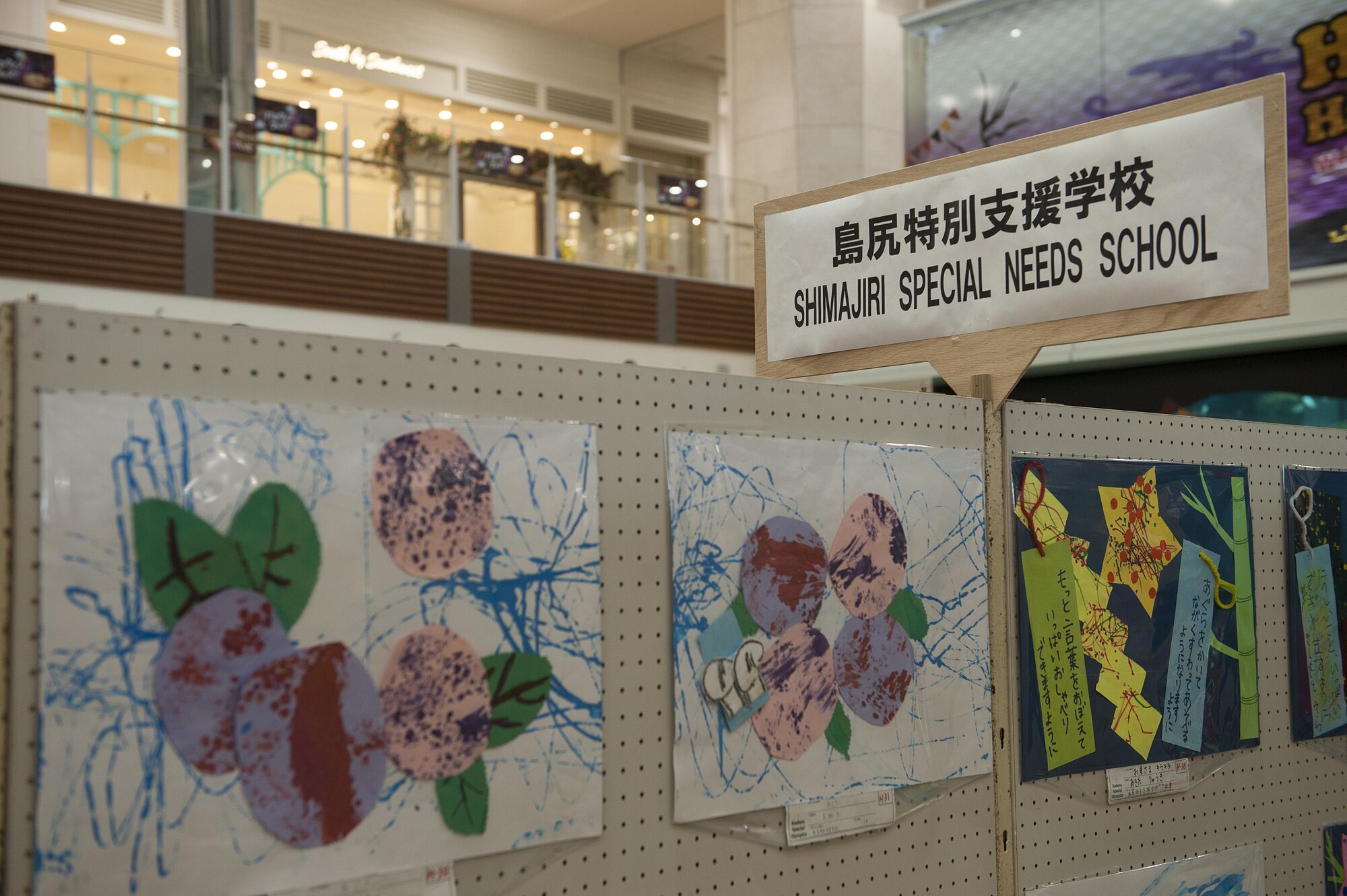The Kadena Special Olympics Art Exhibition showcases artwork at the Rycom Mall Oct. 13-16, 2016 in Okinawa, Japan. Children with special needs made approximately 390 pieces of art showcased on the walls. (U.S. Air Force photo by Airman 1st Class Corey M. Pettis)