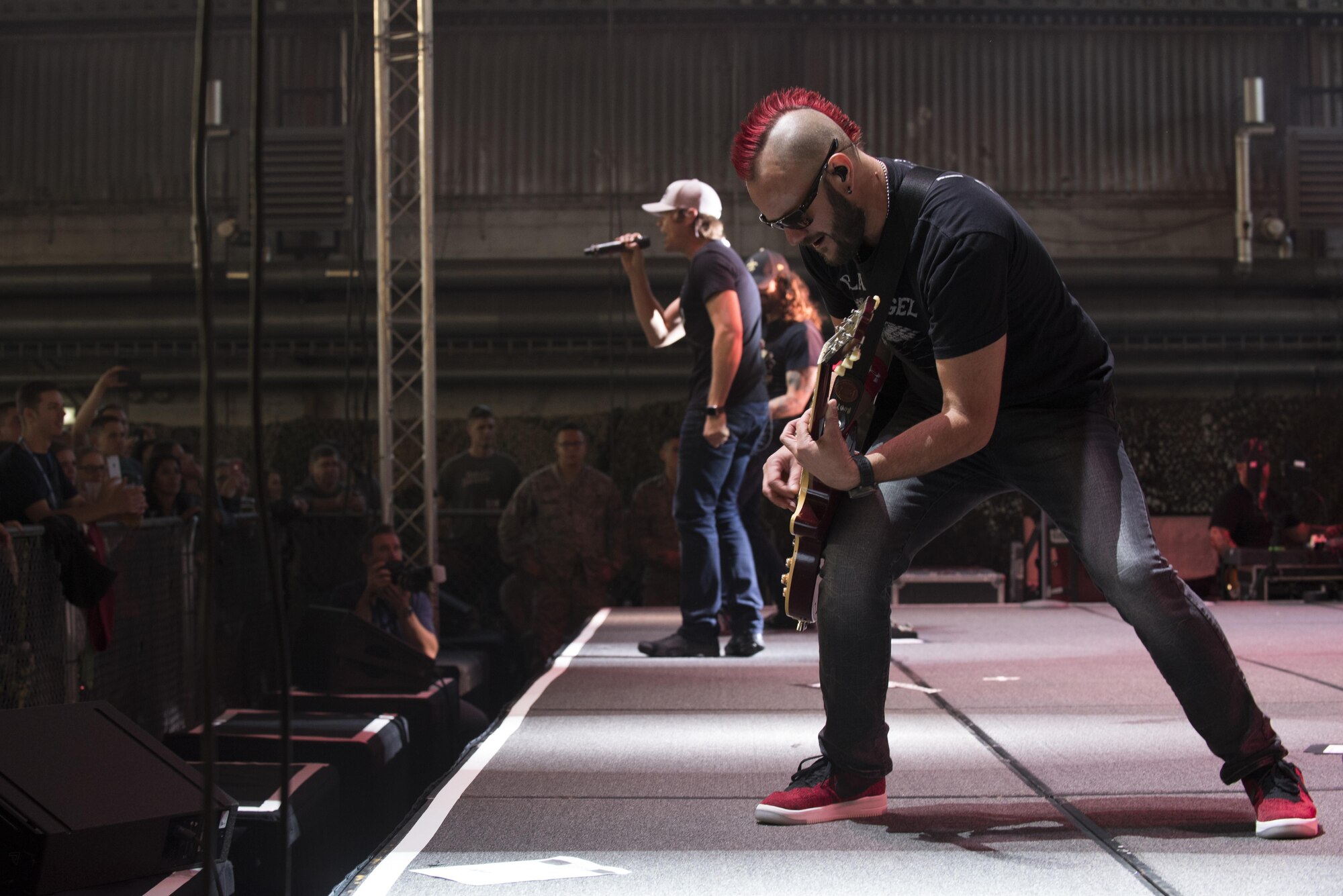 Members of 3 Doors Down, an American rock band from Escatawpa, Miss., perform a show inside Hangar 1 at Spangdahlem Air Base, Germany, Oct. 16, 2016. The band formed over 20 years ago. This concert marks its third time touring with Armed Forces Entertainment, an Air Force command operation, which brings entertainment to U.S. military personnel serving overseas. (U.S. Air Force photo by Airman 1st Class Preston Cherry)
