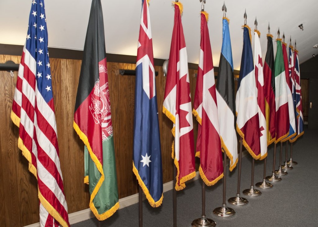 National flags representing the 13 countries that attended the 2015 Warrior Care in the 21st Century symposium were on display at the event in Bethesda, Md. The second annual symposium, scheduled in Tampa, Fla., Oct. 25-27, 2016, will provide the next in-person forum for participating nations to elevate and address key challenges to warrior care. Courtesy photo