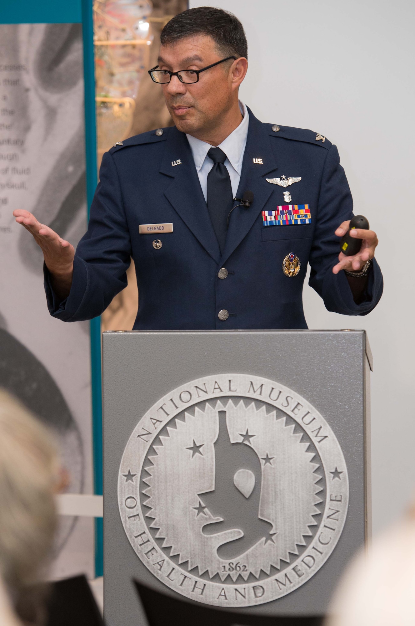 September 2016 Science Cafe.                             
U.S. Air Force Col. Antonio Jose Delgado, Medical Corps, the interim director of the International Health Specialist Program at the Air Force Medical Support Agency, spoke about global health engagement during the September Medical Museum Science Café, at the National Museum of Health and Medicine on Tuesday, Sept. 27, 2016. (Disclosure: This image has been cropped to emphasize the subject.) (National Museum of Health and Medicine photo by Matthew Breitbart/ Released)