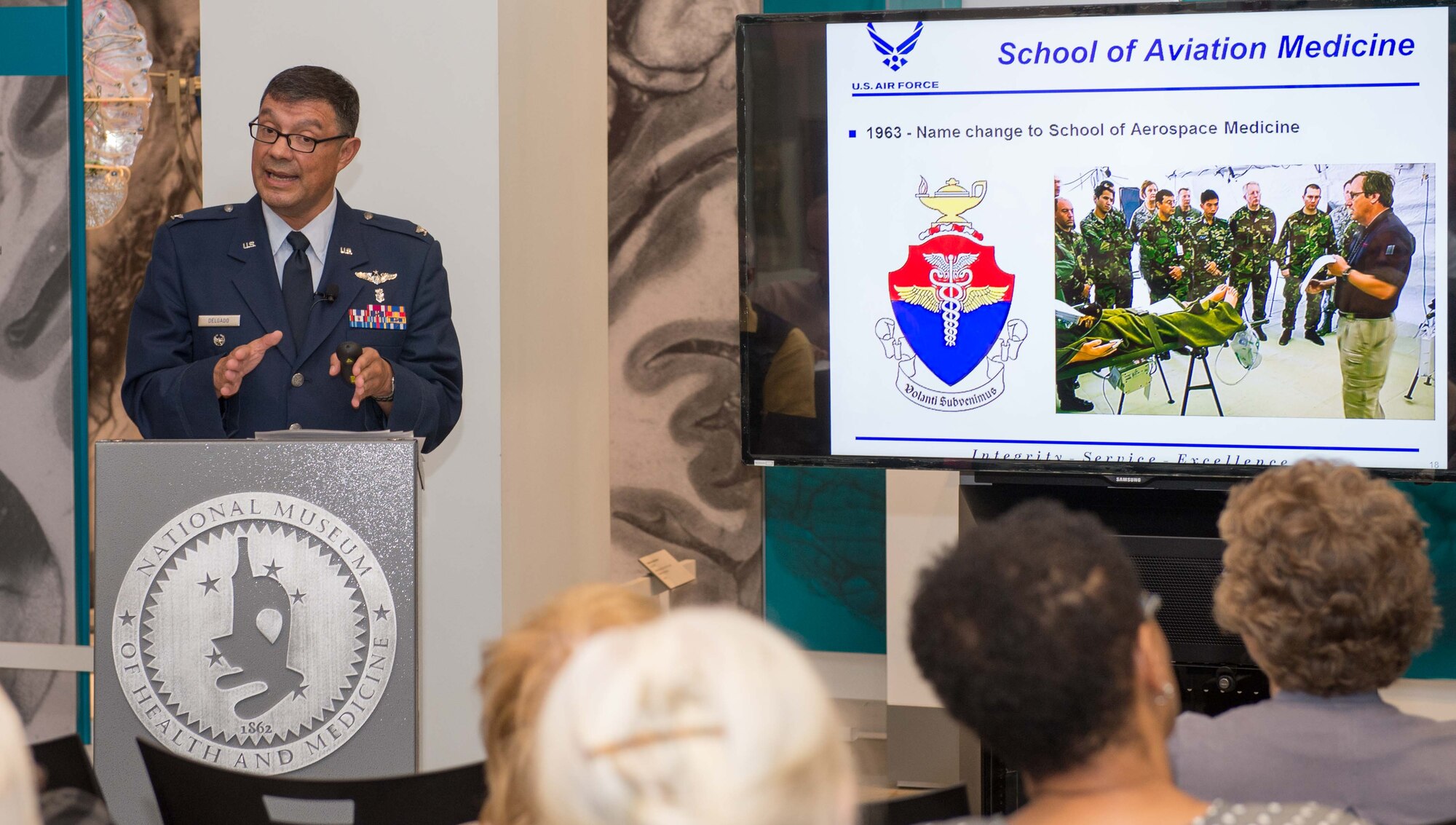 September 2016 Science Cafe.                      
U.S. Air Force Col. Antonio Jose Delgado, Medical Corps, the interim director of the International Health Specialist Program at the Air Force Medical Support Agency, spoke about global health engagement during the September Medical Museum Science Café, at the National Museum of Health and Medicine on Tuesday, Sept. 27, 2016. (Disclosure: This image has been cropped to emphasize the subject.) (National Museum of Health and Medicine photo by Matthew Breitbart/ Released)