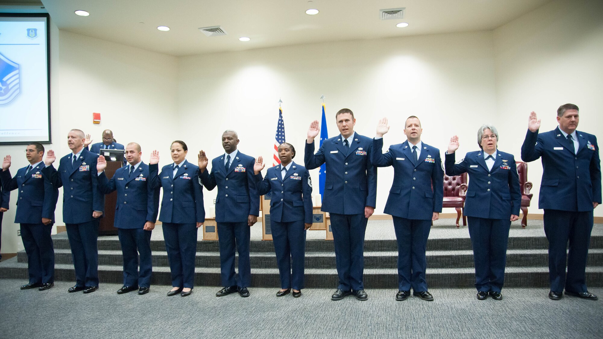 The 403rd Wing's newest master sergeants swear the senior noncomissioned officer oath of induction during a ceremony at the Roberts Consolidated Aircraft Maintenance facility Oct. 16. (U.S. Air Force photo/Senior Airman Heather Heiney)