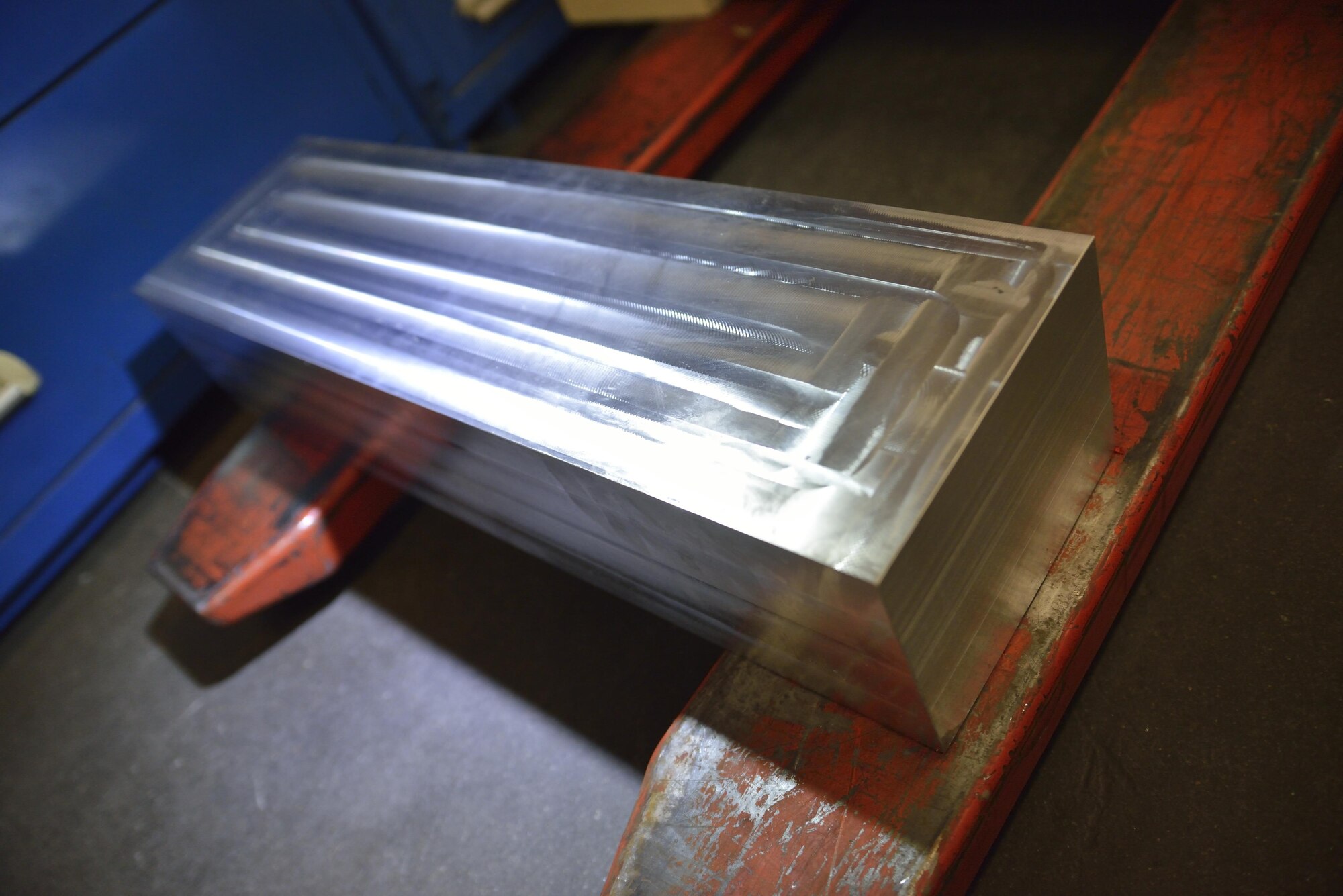 This is the 100 pound hunk of aluminum that will be machined down by the Westover maintainers into a six pound C-5 elevator support bracket.