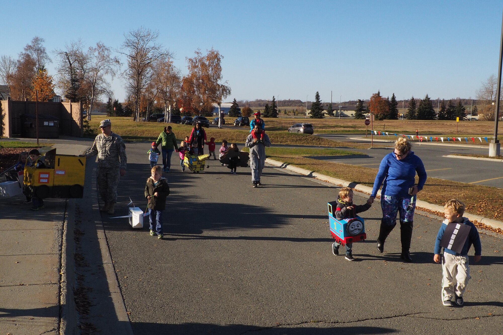 Members and staff of the Sitka Child Development Center hosted a Transportation Parade at the Sitka parking lot, at Joint Base Elmendorf-Richardson, Alaska, Oct. 14, 2016. October is transportation month at Sitka CDC. Floats in the parade highlight different types of transportation. All floats were built at home to encourage parental participation. 