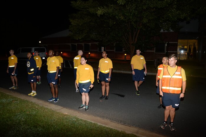 More than a dozen Sailors gather in the parking lot in front of Naval Branch Health Clinic-Albany for a corpsmen’s run in commemoration of the U.S. Navy’s 241st birthday, Oct. 14. Runners made stops at the flagpoles in front of Coffman Hall, Building 3500, and Marine Corps Logistics Command Headquarters, aboard Marine Corps Logistics Base Albany, before rallying at the anchor in front of the clinic.