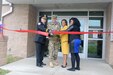 From left, Rick Sewell, the deputy commission for the Homewood Police Department, Col. Edward Merrigan, commander, 308th Civil Affairs Brigade, Congresswoman Robin Kelly from Illinois’ 2nd Congressional District and Tamara Jordan, the veteran’s representative for U.S. Senator Dick Durbin, cut the ceremonial ribbon marking the re-opening of the Vietnam Veterans Memorial Army Reserve Center in Homewood, Illinois, October 15.