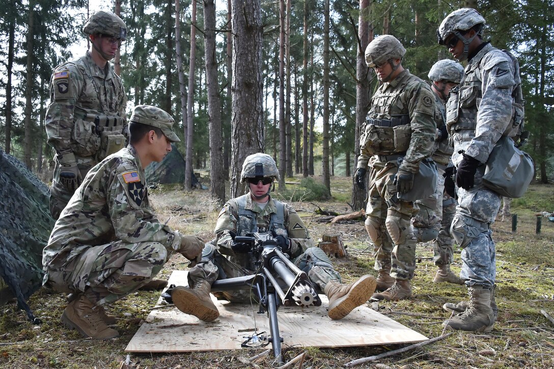 Soldiers train how to clear, load, correct a malfunction, and unload a .50-caliber machine gun during the 173rd Airborne Brigade’s Expert Infantryman Badge training at the 7th Army Training Command’s Grafenwoehr Training Area in Germany, Oct. 17, 2016. The purpose of the Expert Infantry Badge is to recognize infantrymen who have demonstrated a mastery of critical tasks that build the core foundation of individual proficiency that enables them to locate, close with, and destroy the enemy through fire and maneuver and repel an enemy assault in close combat. The soldiers are assigned to the 173rd Airborne Brigade, 2d Cavalry Regiment and 1st Battalion, 4th Infantry Regiment. Army photo by Gertrud Zach
