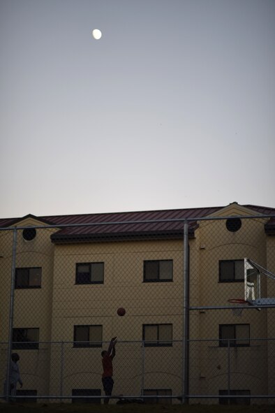 Airman 1st Class Daryl Parker, 608th Air Operations Center offensive duty technician, shoots a basketball at Barksdale Air Force Base, La., Oct. 12, 2016. Parker spends his free time improving his basketball skills to earn a spot on the All-Air Force Men’s Basketball Team. (U.S. Air Force photo/Senior Airman Damon Kasberg)