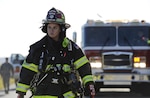 U.S. Air Force Staff Sgt. Brittney Brooke, 325th Civil Engineer Squadron fire protection specialist, walks up to a simulated fuel spill near the 325th Logistics Readiness Squadron fuel depot at Tyndall Air Force Base, Fla., Oct. 13, 2016. The 325th LRS and CES responded to the exercise to stop a simulated 3,500 gallon fuel spill. (U.S. Air Force photo by Senior Airman Solomon Cook/Released)