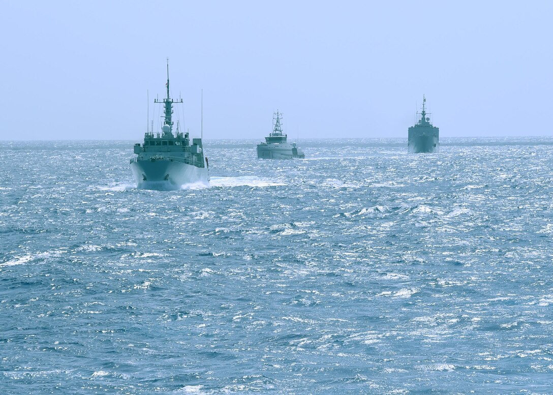 The Canadian ship HMCS Shawinigan, the Trinidad and Tobago Coast Guard TTS QUINAM and the French Tank Landing Ship Dumont D'Urville, line up during the Tradewinds 2016 exercise in the Caribbean Sea, June 26, 2016. Navy photo by Petty Officer 1st Class Todd Stafford