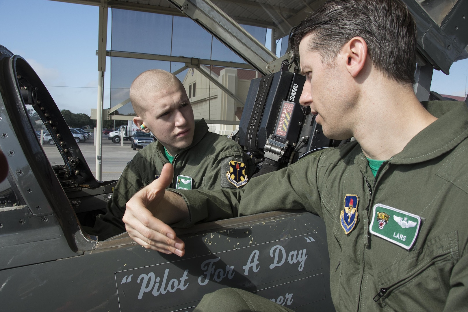 Maj. Gabriel Repucci (right), 560th Flying Training Squadron instructor pilot, speaks with Jake Larner aboard a T-38 Talon during his “Pilot For a Day” orientation Oct. 14 at Joint Base San Antonio-Randolph. Jake’s battle with cancer began May 26, when he suffered from intense lower abdominal pains and was taken to the emergency room at the San Antonio Military Medical Center at JBSA-Fort Sam Houston by his mother, Kristie Davidson. 