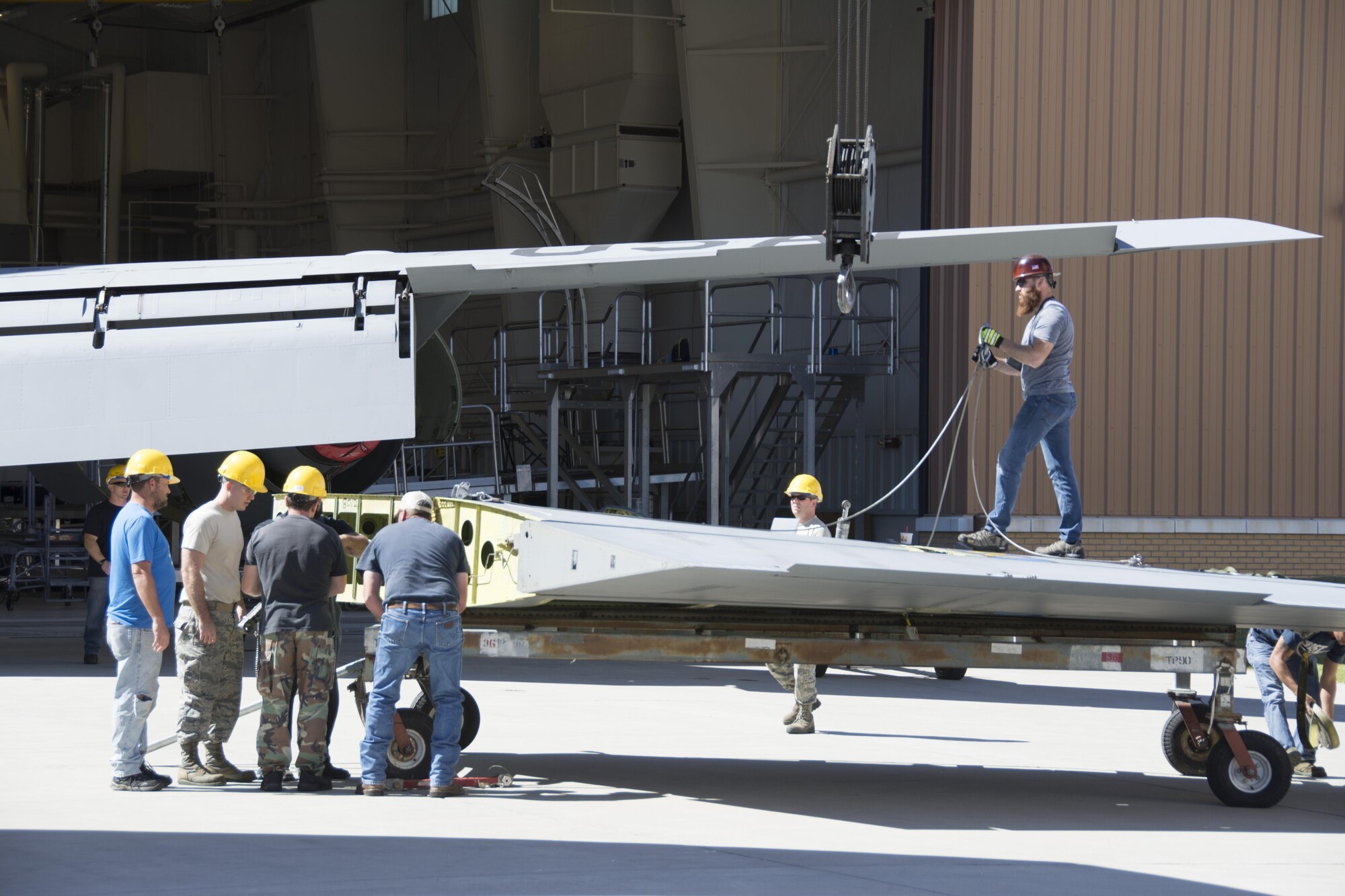 Members of the 507th Maintenance Squadron and the 564th Aircraft Maintenance Squadron work together to install a vertical stabilizer on a KC-135 Stratotanker following rudder and stabilizer repair Sept. 27, 2016. The two squadrons worked together to complete the task, normally performed at the Oklahoma City Air Logistics Complex. (U.S. Air Force photo by Tech. Sgt. Lauren Gleason)