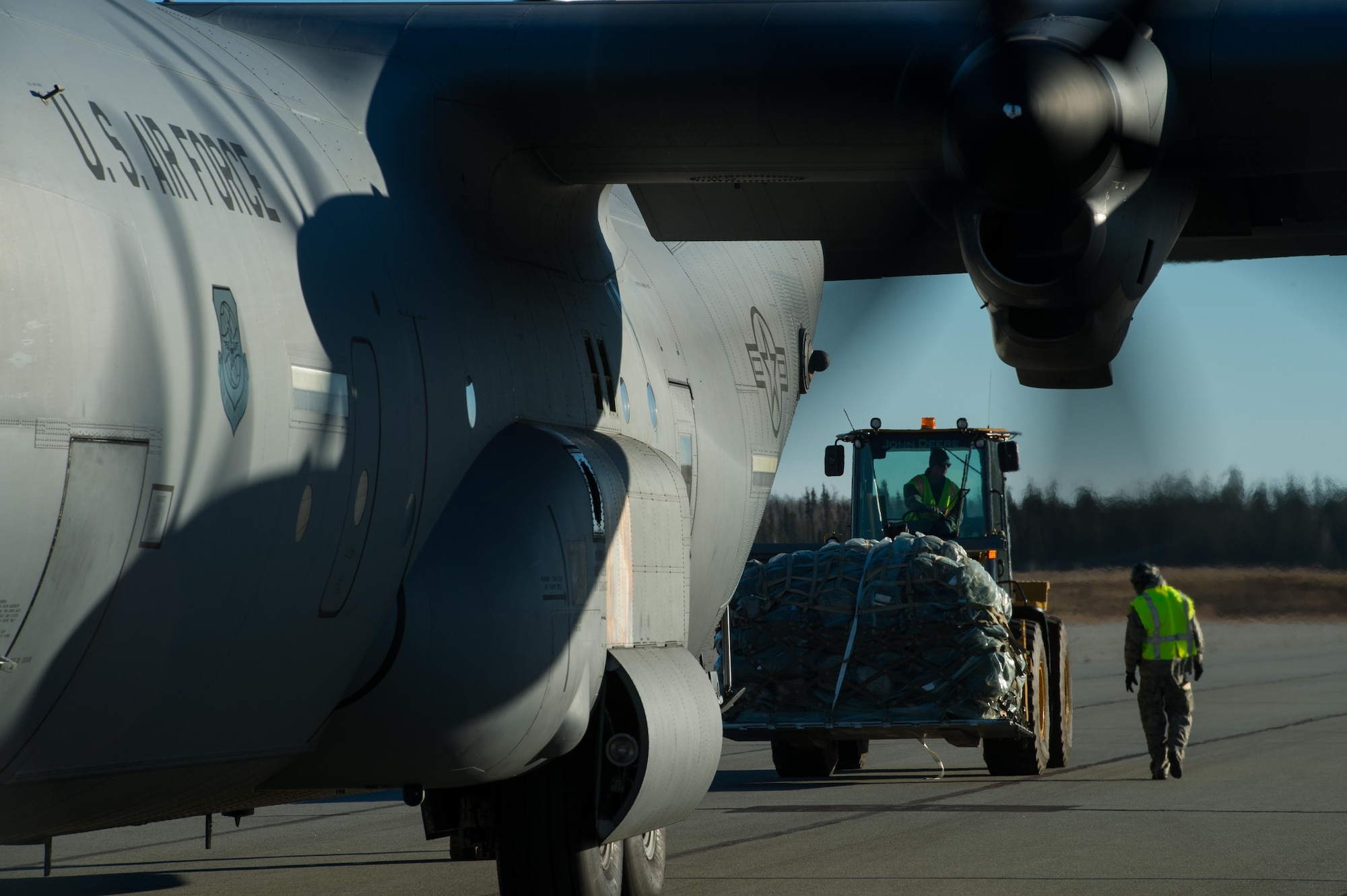 U.S. Airmen with the 621st Contingency Response Wing offload cargo from a C-130J Super Hercules aircraft at Allen Army Airfield, Alaska during exercise RED FLAG-Alaska, Oct. 13, 2016. RF-A is a series of Pacific Air Forces commander-directed field training exercises for U.S. and partner nation forces, providing combined offensive counter-air, interdiction, close air support, and large force employment training in a simulated combat environment. (U.S. Air Force photo by Master Sgt. Joseph Swafford)
