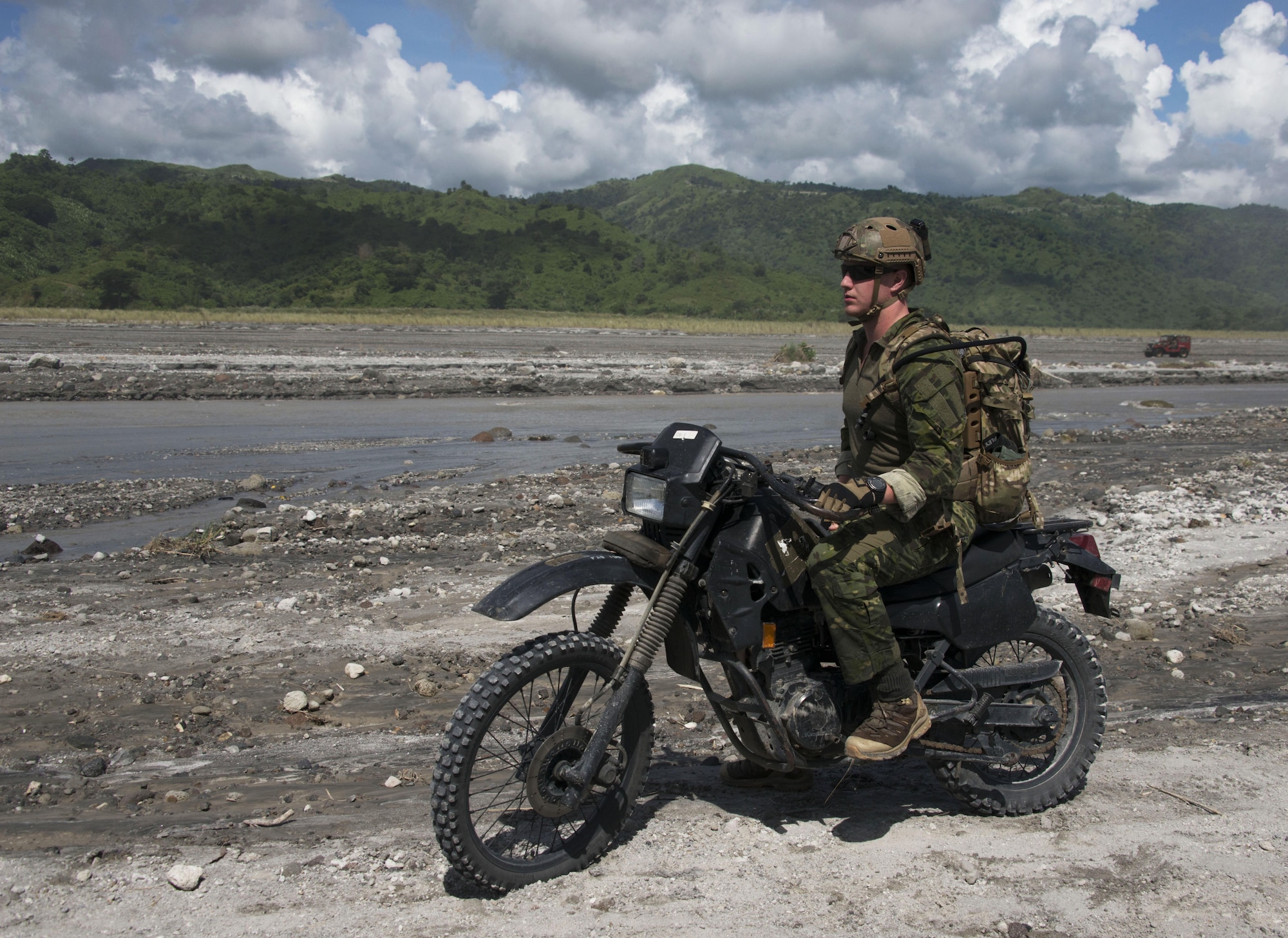 A 320th Special Tactics Squadron combat controller (CCT) pictured riding a dirt bike in Crow Valley in Tarlac Province, Philippines during a Teak Piston 2016 community relations event with Philippine Forward Air Controllers (PFACs) from the 710th Special Operations Wing. CCTs need to be competent on a wide variety of vehicles, including dirt bikes in order to infiltrate in whatever way the mission requires (U.S. Air Force photos by Capt. Jessica Tait)