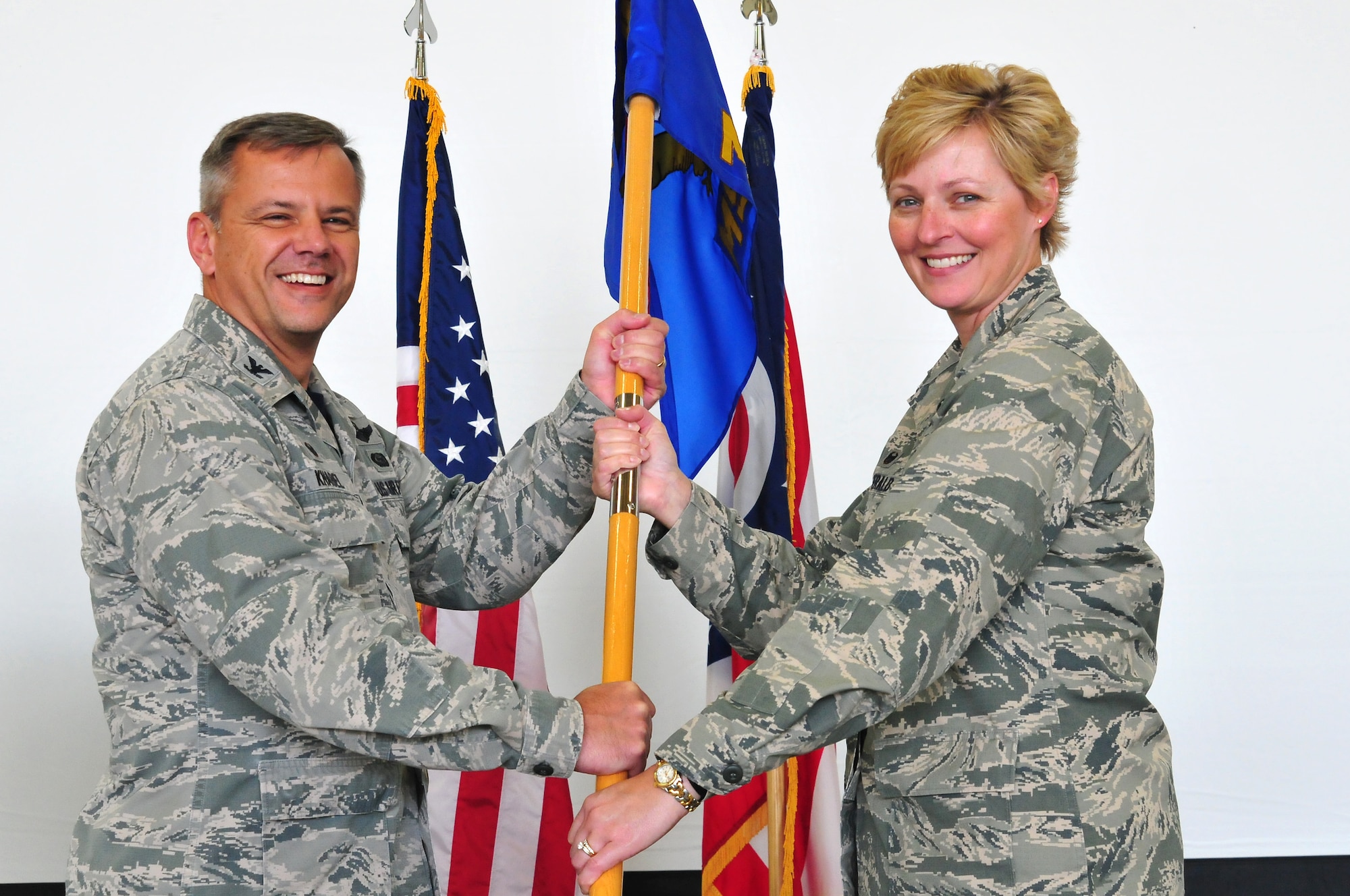 Lt. Col. Kimberly Fitzgerald, the incoming 178th Mission Support Group commander, assumes her new leadership role during an assumption of command ceremony at Springfield Air National Guard Base in Springfield, Ohio, Oct. 16, 2016. Fitzgerald has served in the Air National Guard for over 20 years. (U.S. Air National Guard photo by Airman 1st Class Rachel Simones)