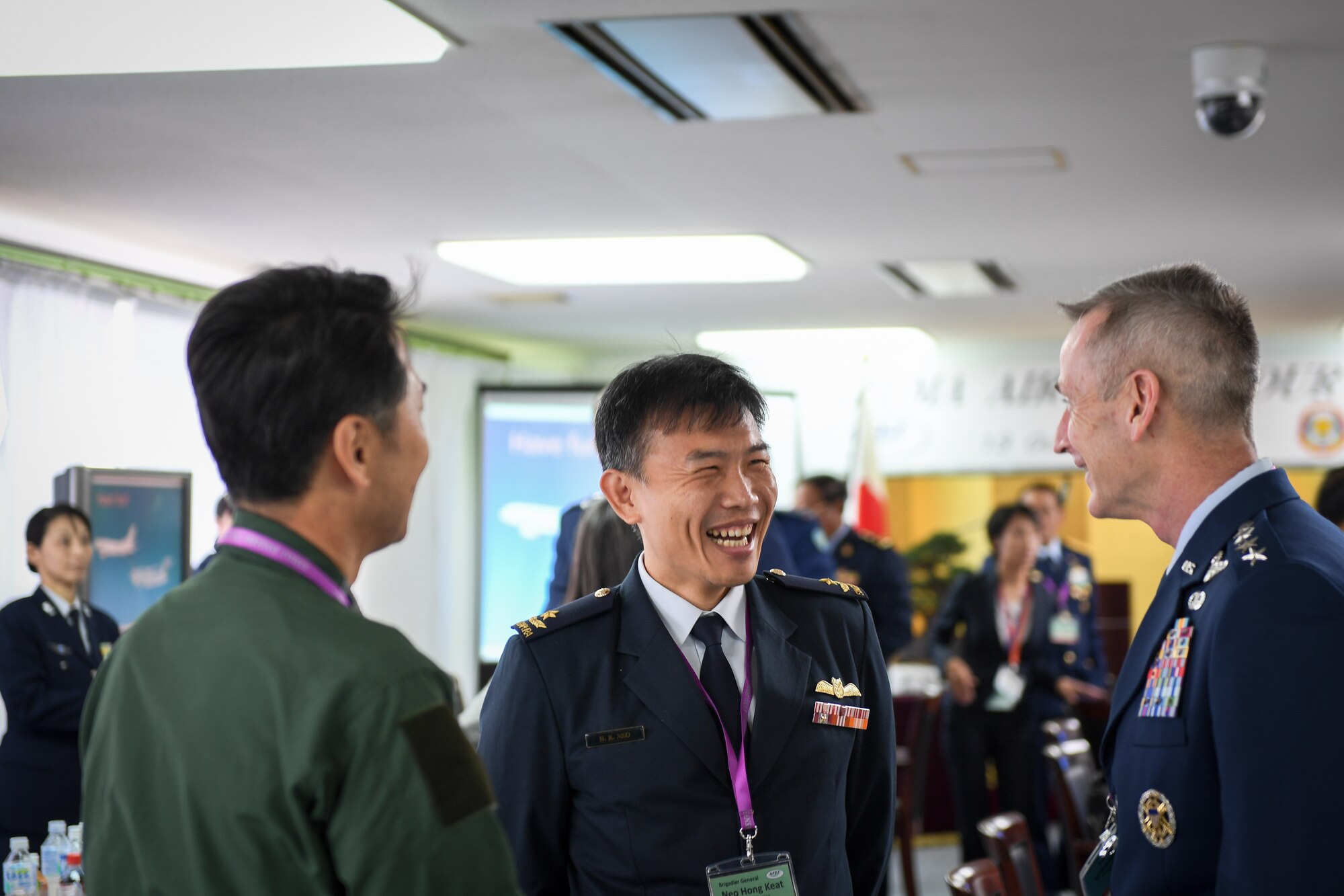 U.S. Air Force Gen. Terrence O’Shaughnessy, Pacific Air Force commander, talks to Singaporean Air Force Brig. Gen. Neo Hong Keat, commander of Air Power Generation Command, during a tour of Japan Air Self-Defense Force Iruma Air Base, Japan, Oct. 13, 2016. The tour allowed Air Chiefs, from nations throughout the Indo-Asia-Pacific region, to visit a partner nation base and experience a flight on XC-2 cargo plane. (U.S. Air Force photo by Staff Sgt. Michael Smith)