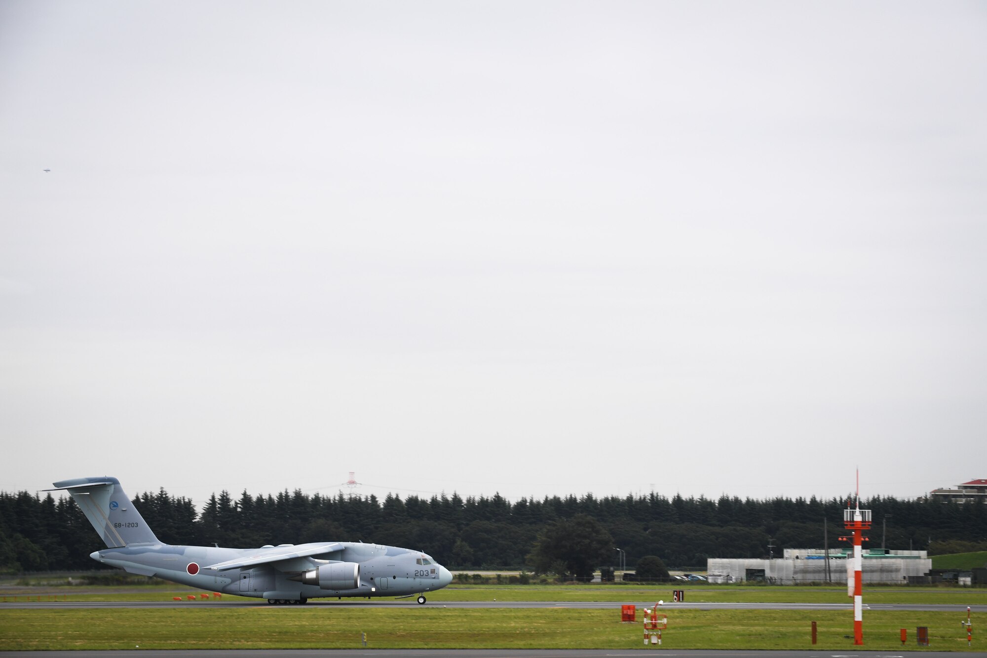 A Japan Air Self-Defense Force XC-2 cargo plane prepares to take off for a familiarization flight at Iruma Air Base, Japan, Oct. 13, 2016. The plane has recently been added to the JASDF’s fleet of aircraft and the flight allowed them to showcase their new capabilities. (U.S. Air Force photo by Staff Sgt. Michael Smith)
