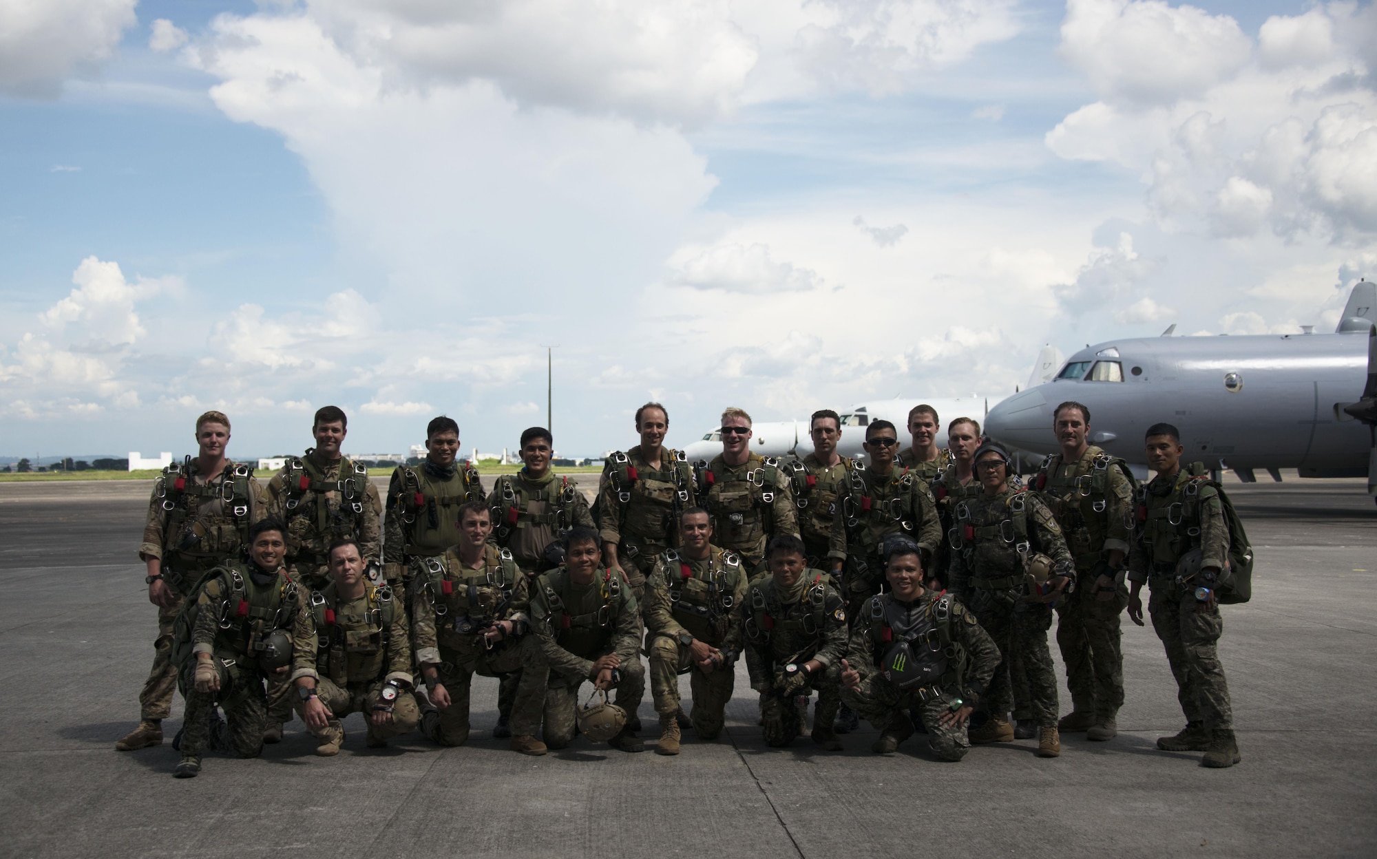 Members from Operational Detachment Alpha (ODA) 1324 and Philippine Army Light Reaction Regiment (LRR) pose for a group photo at Clark Air Base, Sept. 24. Air Commandos from the 353rd Special Operations Group supported high-altitude, low-opening (HALO) airdrops into Crow Valley in Tarlac Province, Philippines with joint and combined partners during Teak Piston 2016. ODA 1324 is a part of the United States Army's Third Battalion, 1st Special Forces Group Airborne. (U.S. Air Force photo by Capt. Jessica Tait)