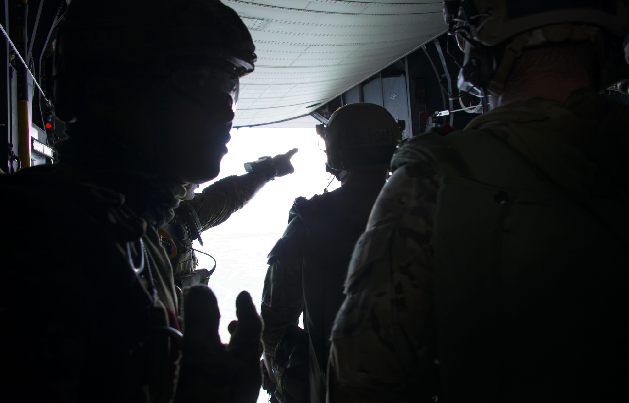 A Philippine Army Light Reaction Regiment (LRR) member instructs team members prior to high-altitude, low-opening (HALO) airdrops from a MC-130H Combat Talon II. Getting a U.S. aircraft dedicated for military free-fall operations is very rare for the Armed Forces Philippines and speaks to our enduring partnership and commitment to their success. (U.S. Air Force photo by Capt. Jessica Tait)