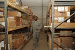 Staff Sgt. Terrance Branch, 386th Expeditionary Logistics Readiness Squadron materiel management journeyman, looks for a part in the aircraft parts store warehouse Oct. 13, 2016 at an undisclosed location in Southwest Asia. Branch is a member of the APS team that is responsible for storing and issuing parts for nine weapon systems within their shops responsibility. (U.S. Air Force photo/Senior Airman Zachary Kee)