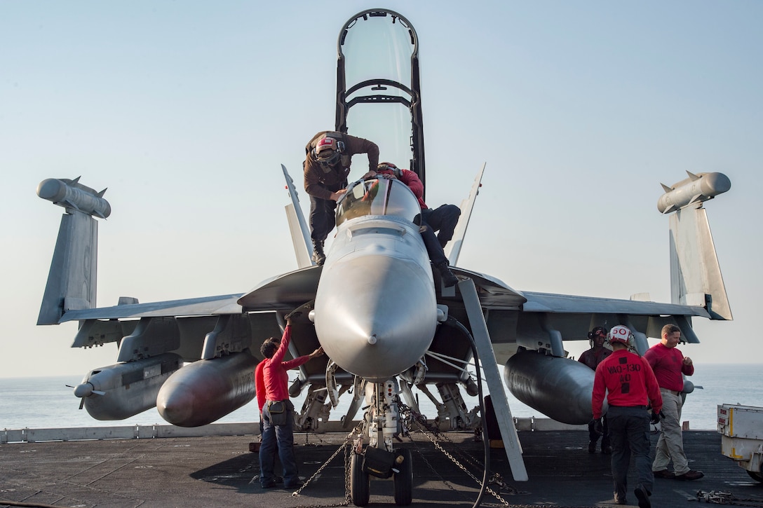 161018-N-TV337-009

ARABIAN GULF (Oct. 18, 2016) Sailors conduct pre-flight inspections on an E/A-18G Growler assigned to the Zappers of Electronic Attack Squadron (VAQ) 130 on the flight deck of the aircraft carrier USS Dwight D. Eisenhower (CVN 69) (Ike). Ike and its Carrier Strike Group are deployed in support of Operation Inherent Resolve, maritime security operations and theater security cooperation efforts in the U.S. 5th Fleet area of operations. (U.S. Navy photo by Petty Officer 3rd Class Robert J. Baldock)