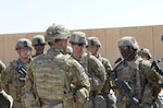 Lt. Gen. Stephen J. Townsend, commander Combined Joint Task Force Operation Inherent Resolve, visits Task Force Strike, 101st Airborne Division (Air Assault) at Qayyarah West Airfield, Iraq. Coalition troops arrived to Qayyarah West Airfield to enable the Iraqi Security Forces to defeat Da'esh by providing logistical, engineering and artillery fires in support of the liberation of Mosul. The mission of Operation Inherent Resolve is to defeat Da’esh (an Arabic acronym for ISIL) in Iraq and Syria by supporting the Government of Iraq with trainers, advisors and fire support, to include aerial strikes and artillery fire. (USMC photo by Capt. Ryan E. Alvis/Released)