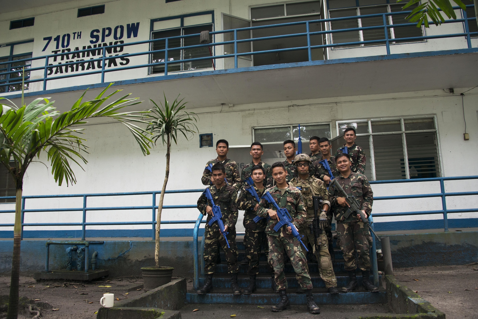 Members of the 710th Special Operation Wing (SPOW) and Capt. Caesar Baldemor, Deployed Aircraft Ground Response Element flight commander, pose for a group photo prior to the execution of their capstone exercise. The 353rd Special Operations Group participated in Teak Piston 2016 with the Philippine Air Force at Clark Air Base and Mactan-Benito Ebuen Air Base from Sept. 15-30. (U.S. Air Force photos by Capt. Jessica Tait)