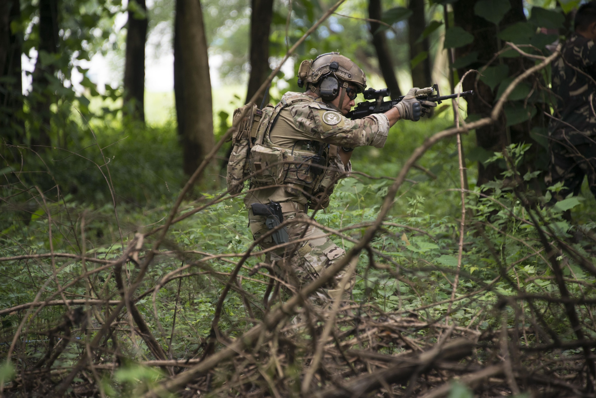 Capt. Caesar Baldemor, Deployed Aircraft Ground Response Element flight commander, leads Airmen from the 710th Special Operations Wing in a capstone exercise. The 353rd Special Operations Group participated in Teak Piston 2016 with the Philippine Air Force at Clark Air Base and Mactan-Benito Ebuen Air Base from Sept. 15-30. (U.S. Air Force photos by Capt. Jessica Tait)