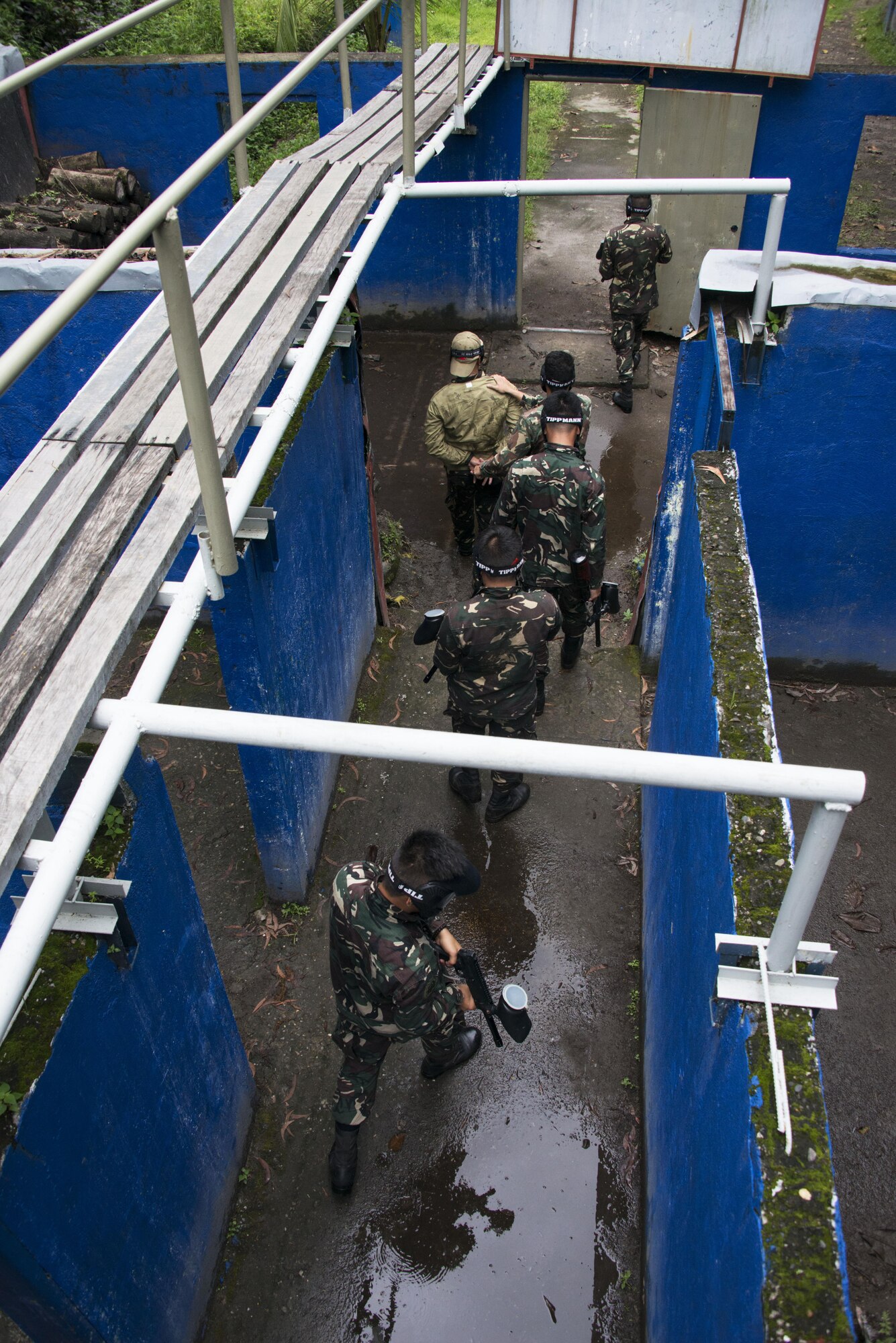 Members of the 710th Special Operations Wing conduct detain a simulated adversary during their capstone exercise. At the culmination of Teak Piston 2016, the students were tested on skills learned in the classroom and leadership in the field. (U.S. Air Force photos by Capt. Jessica Tait)