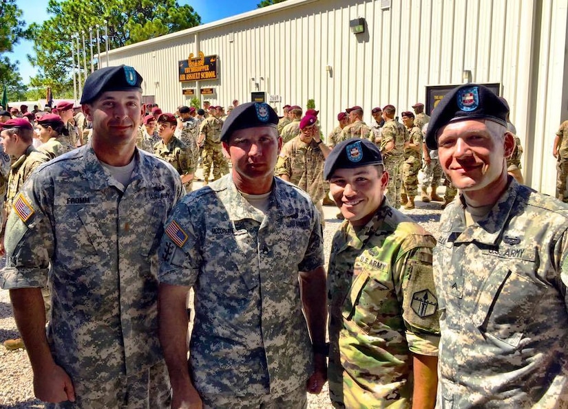 Spc. Orozco (second from right), assigned to 387th Engineer Company, 315th Engineer Battalion, 301st Maneuver Enhancement Brigade poses for a photograph with members of his unit after completing the DeGlopper Air Assault School at Fort Bragg, N.C. July 28, 2016. Completing Air Assault school was one of the many events Orozco took part in to train for the Army Best Warrior competition. (U.S. Army Photo/Released).