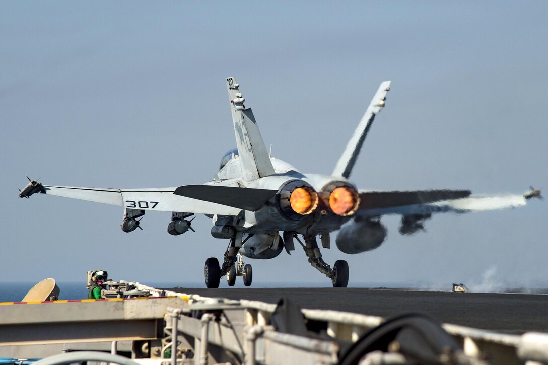An F/A-18C Hornet aircraft launches from the flight deck of the aircraft carrier USS Dwight D. Eisenhower in the Persian Gulf, Oct. 16, 2016. Navy photo by Seaman Christopher A. Michaels