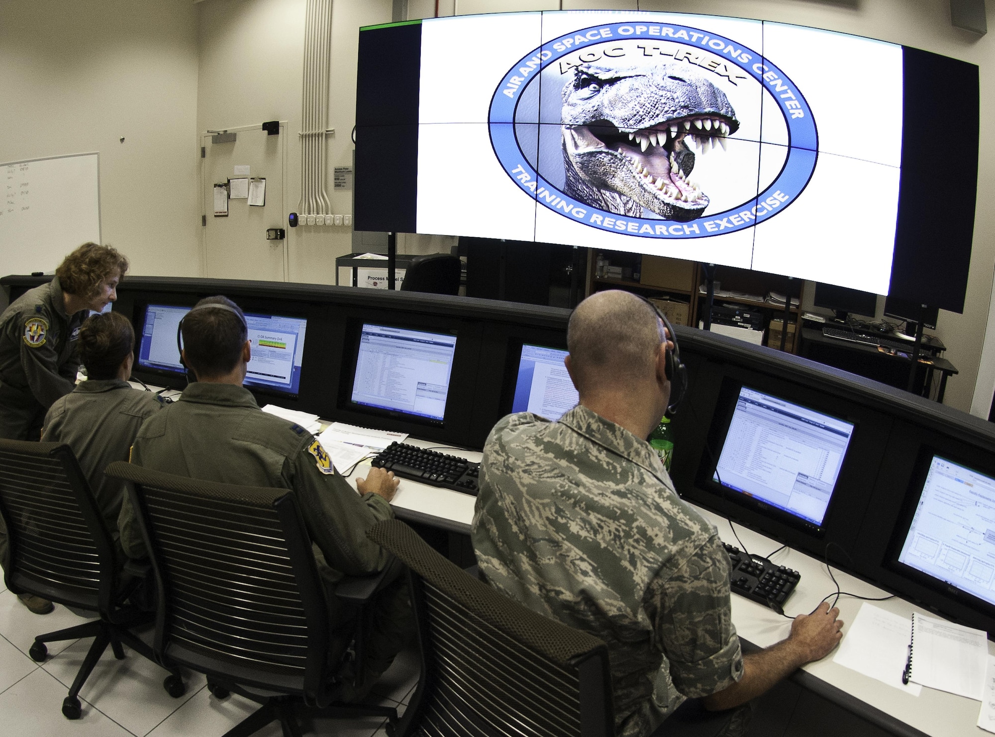 Analysts participate in a training research exercise, or T-REX, created by the 711th Human Performance Wing's Warfighter Readiness Research Division at Wright-Patt. These trainings better equip analysts by simulating real-world intelligence fusion/collaboration, and test the integration of multiple research and development testbeds. (U.S. Air Force photo by Richard Eldridge)