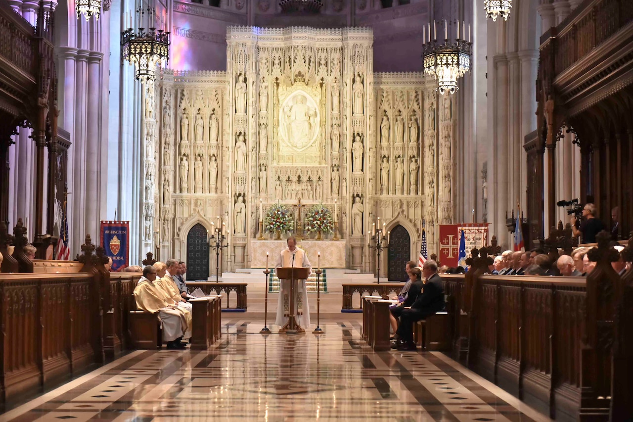 Family and representatives of the U.S. and French militaries attend the commemoration marking the 100th anniversary of the death of Norman Prince, a founding member of the Lafayette Escadrille and one of the first Americans killed in WWI, at the National Cathedral in Washington, Oct. 14, 2016. Courtesy photo