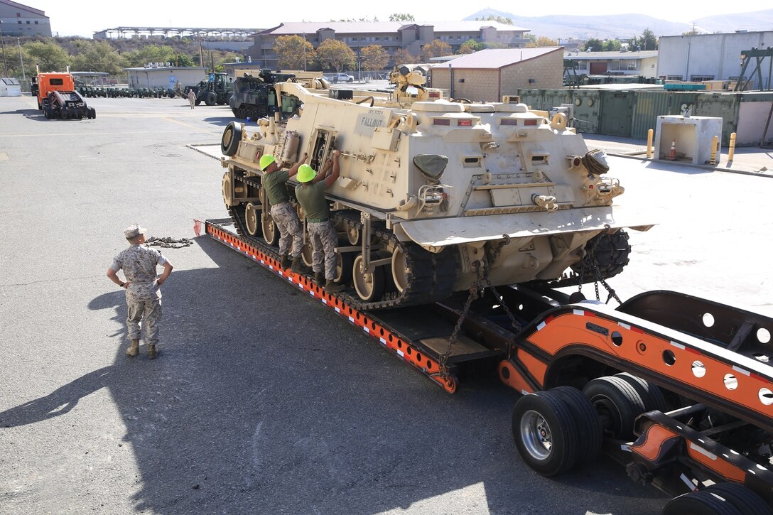 U.S. Marines with Combat Logistics Regiment 15 secure the M-88A2 for transportation from Camp Pendleton, Calif., to March Air Force Reserve Base, Calif., Oct. 3, 2016. The M-88A2 HERCULESwill be airlifted from March AFB to Marine Corps Air Ground Combat Center Twentynine Palms, Calif.