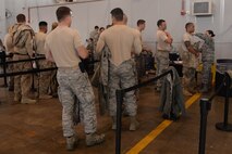 Team Minot lines up for an influenza vaccination at Minot Air Force Base, N.D., Oct. 13, 2016. The 5th Medical Group conducted a point of distribution exercise to provide adequate vaccinations in case of a mass-epidemic virus was ever contracted here. (U.S. Air Force photo/Airman 1st Class Jessica Weissman)