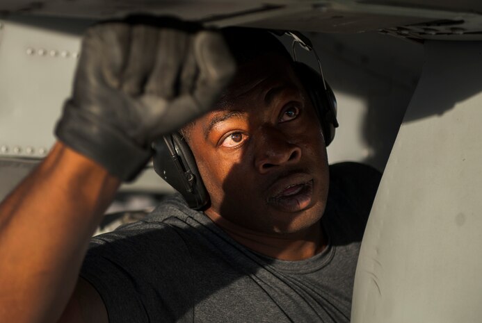 Tech. Sgt. Daryl Speaks, 757th Aircraft Maintenance Squadron weapons expeditor, checks the panels of an A-10 Thunderbolt II during the 57th Wing’s third quarter weapons load crew competition at Nellis Air Force Base, Nev., Oct. 7. The load crew competition is a quarterly event held at Nellis AFB to highlight the exceptional Airmen of the 57th Maintenance Group. (U.S. Air Force photo by Airman 1st Class Kevin Tanenbaum/Released)