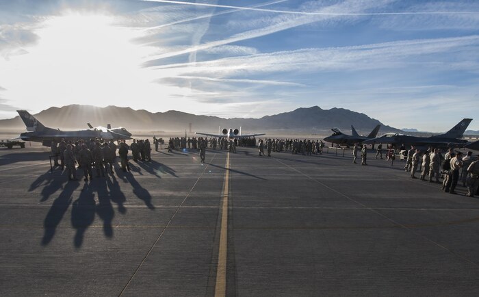 Aircraft that will be used during the 57th Wing’s third quarter weapons load crew competition sit on the flightline before the competition begins at Nellis Air Force Base, Nev., Oct.
7. Load crews were chosen for their outstanding duty performance and exceptional loading ability during the friendly competition between F-15, F-16, F-22, F-35 and A-10 crews. (U.S. Air Force photo by Airman 1st Class Kevin Tanenbaum/Released)